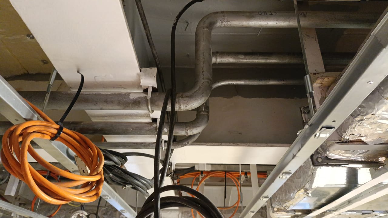 Cover hot water pipe line with Insulation Glass wool termal resistance & alumunium foil Photo